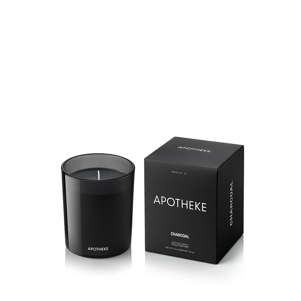 APOTHEKE Charcoal Petite Candle in its black glass vessel